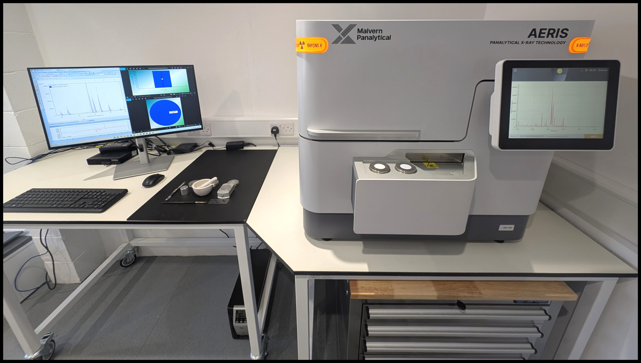 Image showing an X-ray diffractometer and testing apparatus.